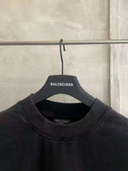Black Balenciaga short-sleeve T-shirt neckline with BALENCIAGA logo label