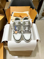 Louis Vuitton trainer sneakers in box, light gray uppers with gray LV heel logos