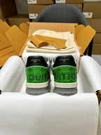 Louis Vuitton trainer sneakers, rear view with green heel panels and white sole