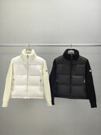 White and black long puffer jackets, zip-front with stand collar, side view