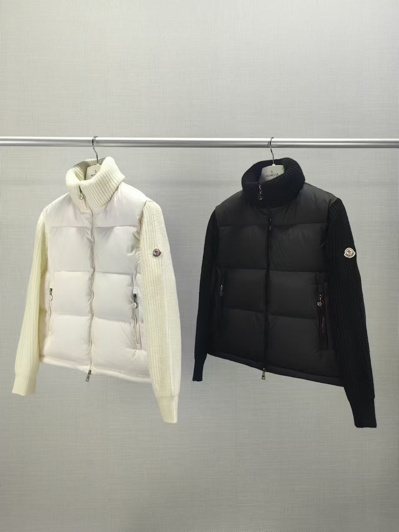 Long puffer jackets, white and black, ribbed knit collar, zip front