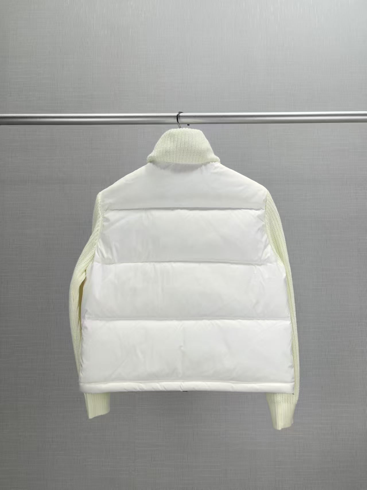 Back view long puffer jacket, knit collar, cream padded front panels