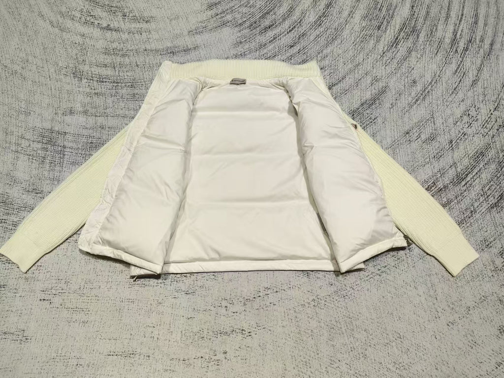Cream puffer jacket inside view, zip front, knit cuffs, padded lining