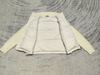 Cream puffer jacket inside view, zip front, knit cuffs, padded lining