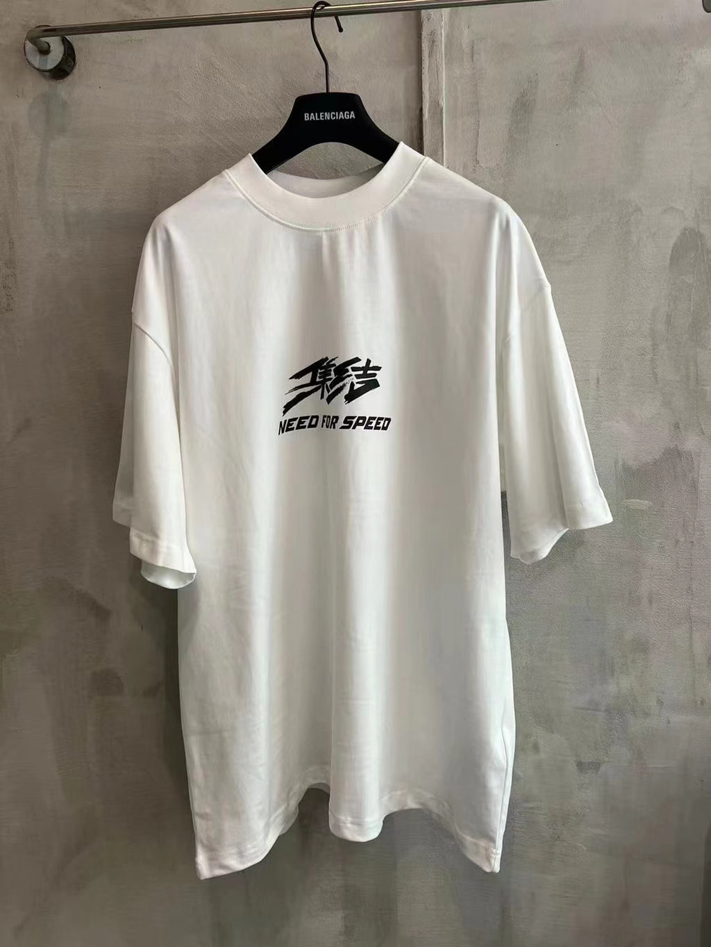 Balenciaga white short-sleeve T-shirt with Need for Speed logo on chest