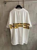Balenciaga white short-sleeve T-shirt with black and yellow Need for Speed back print