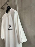 Balenciaga white short-sleeve T-shirt with Need for Speed logo on chest, side view