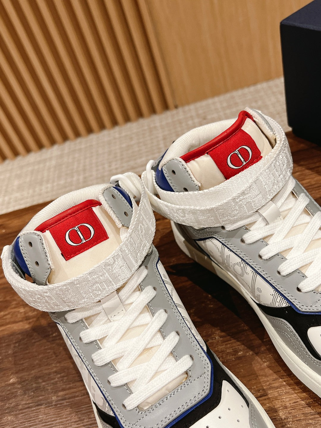 Unisex high-top sneakers, white with red interior lining and blue collar, lace-up