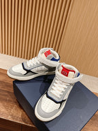 Unisex high-top sneakers, white with navy panels and red/blue logo at tongue