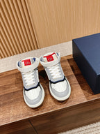 Unisex high-top sneakers, white with navy and red accents, lace-up design