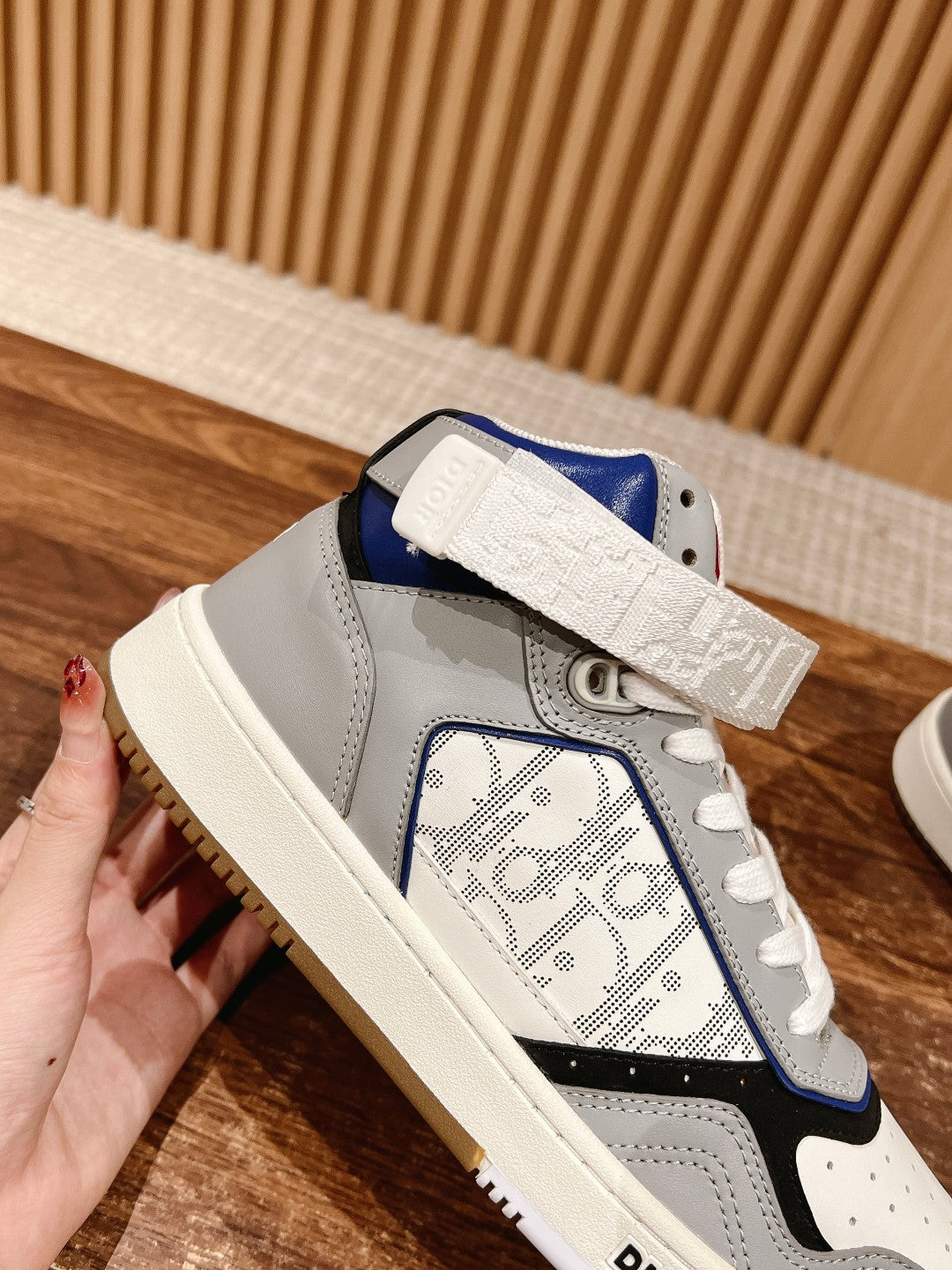 Unisex high-top sneakers, white with blue graphic panel and beige sole, lace-up