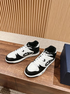 Dior unisex sneakers, white toe panels with black overlays and lace-up closure