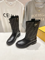 Black Fendi ladies boots pair, front angle with FF monogram and side pull tabs