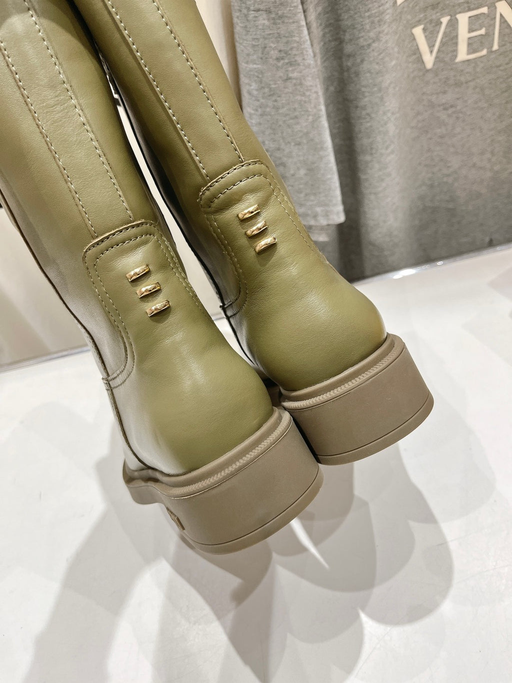 Fendi ladies olive green leather boots with stacked heel and stitched panel details