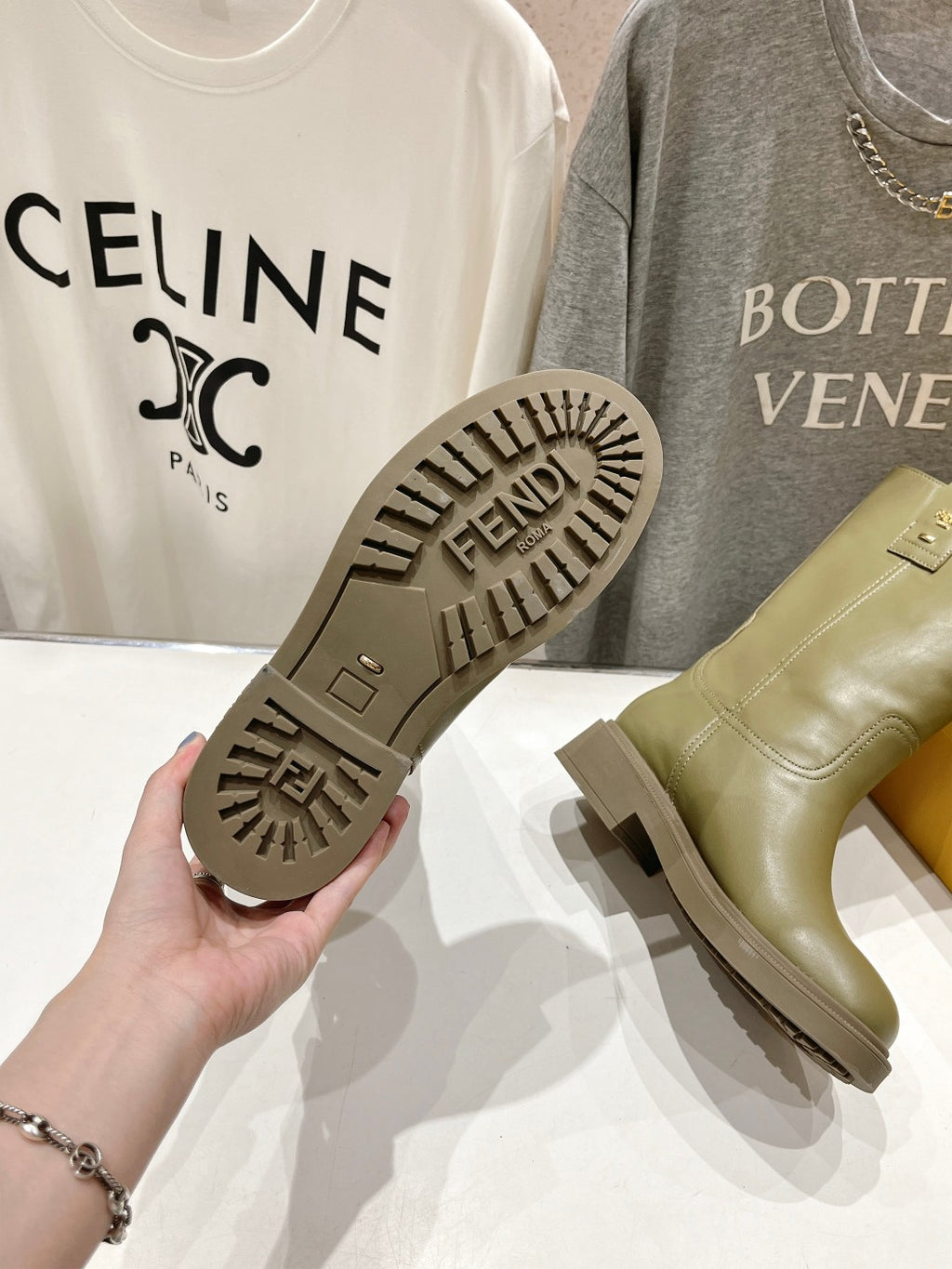 Fendi ladies olive green boot soles with tread pattern and logo branding