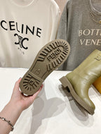 Fendi ladies olive green boot soles with tread pattern and logo branding