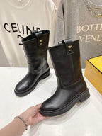 Fendi women’s leather boots, black, mid-calf with side buckle and sturdy flat sole.