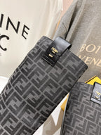 Fendi monogram tall boot shaft detail, gray-black woven pattern with logo patch