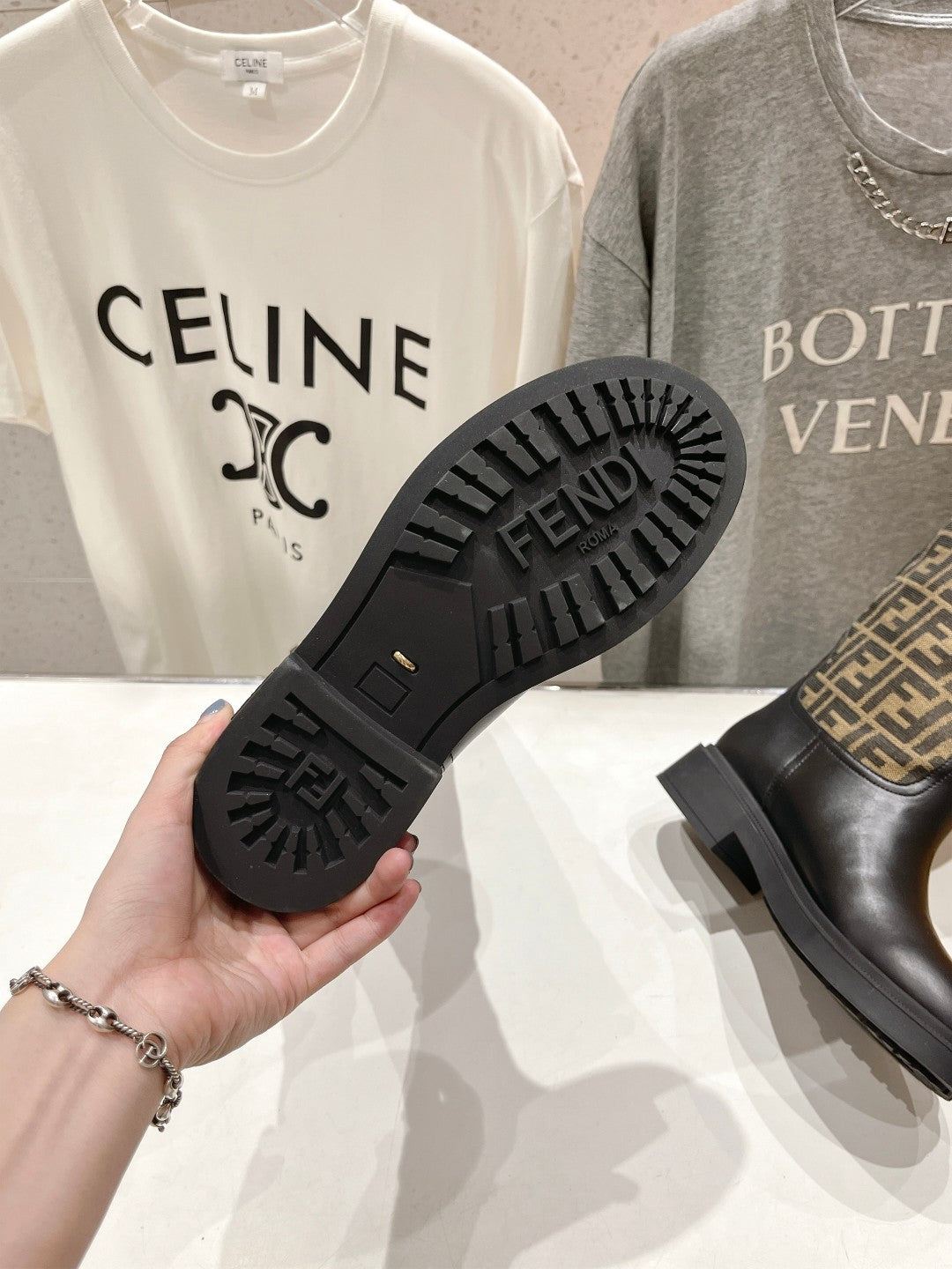 Fendi FF monogram tall boot outsole close-up with traction tread