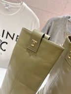 Olive green boot upper with pull-on tab and Fendi logo patch.