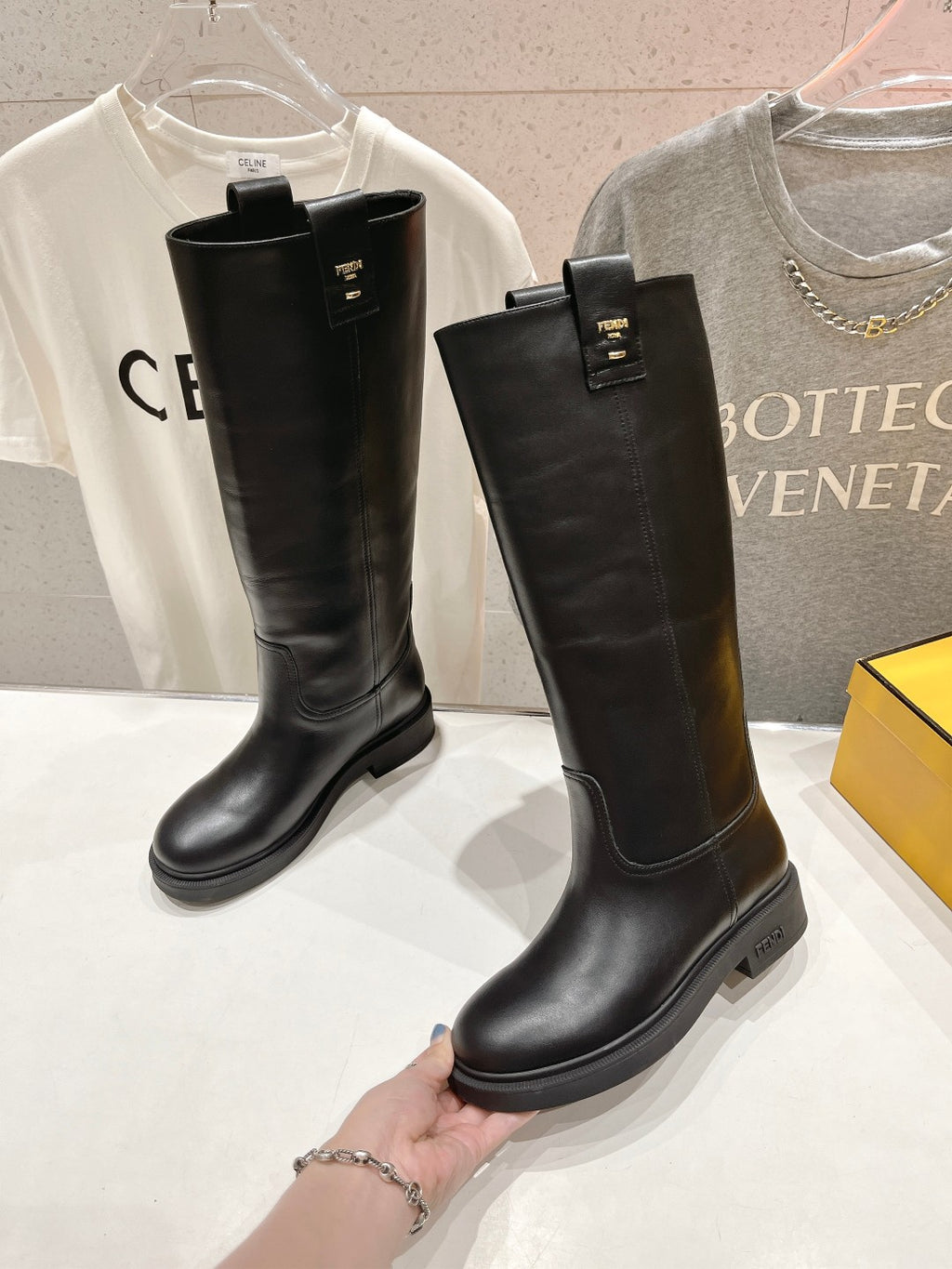 Black knee-high leather boots with low stacked heel, shown side by side