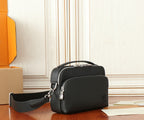 Black leather crossbody bag, front view, with zipper pocket and shoulder strap.