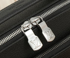 Close-up of black bag zipper with silver pull tabs and LV hardware