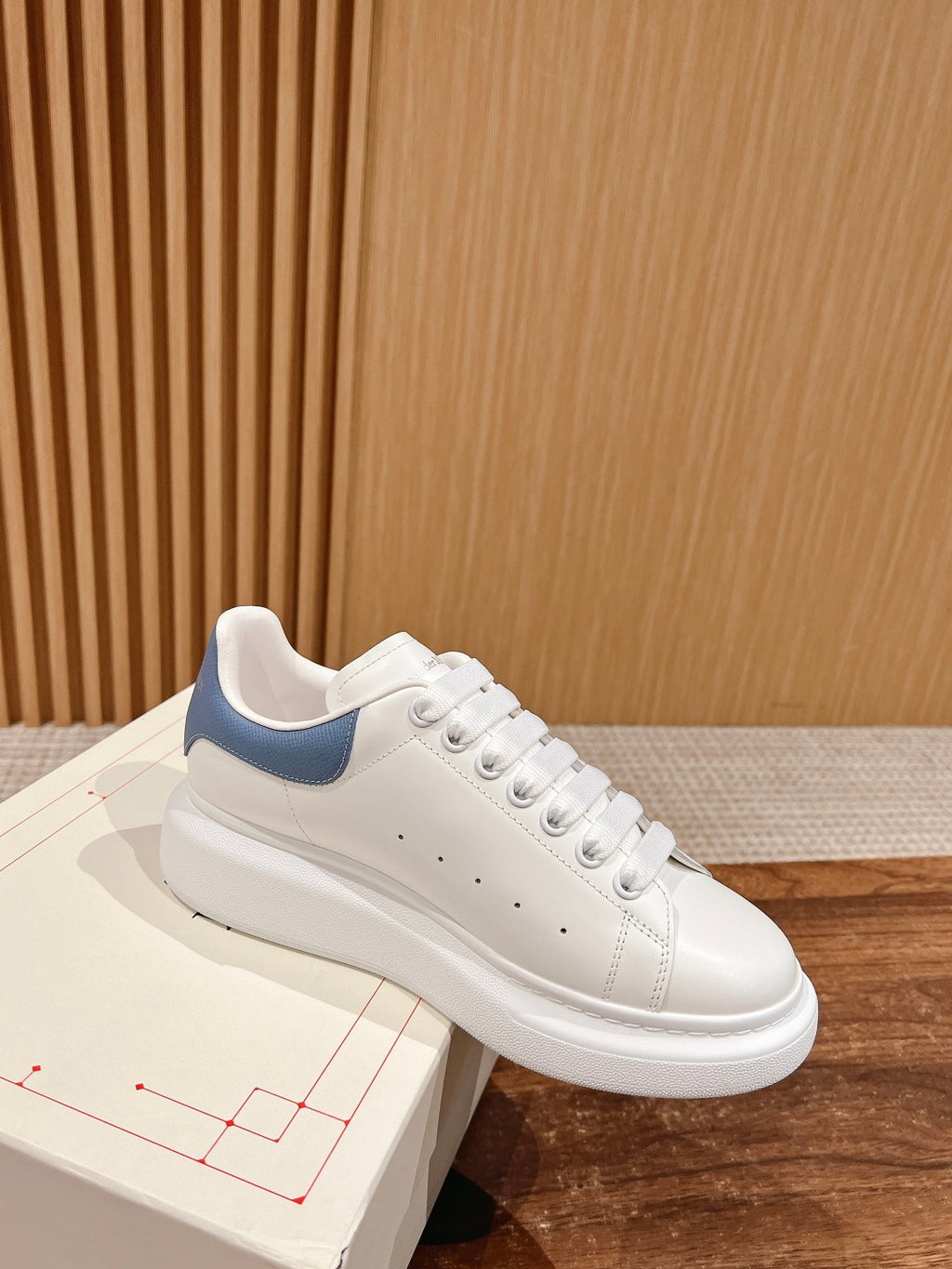 Alexander McQueen white leather sneakers with blue side panel, lace-up, thick sole