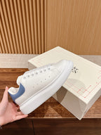 Alexander McQueen white leather sneakers with blue heel panel, lace-up, rubber sole