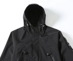 Black hooded coat with front button placket and drawstring toggles