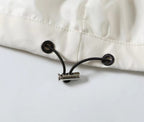 Burberry white jacket hood drawcord with black cord toggles