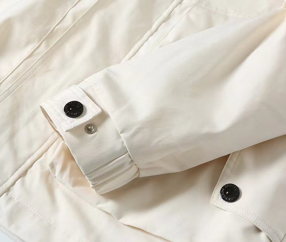 Burberry white jacket sleeve cuff with snap buttons and stitched placket