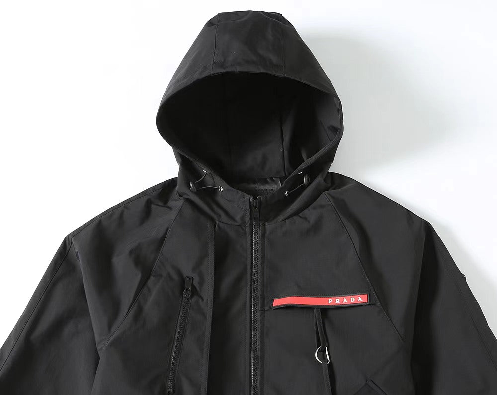 Black Prada hooded zip jacket with red logo tab and drawcord