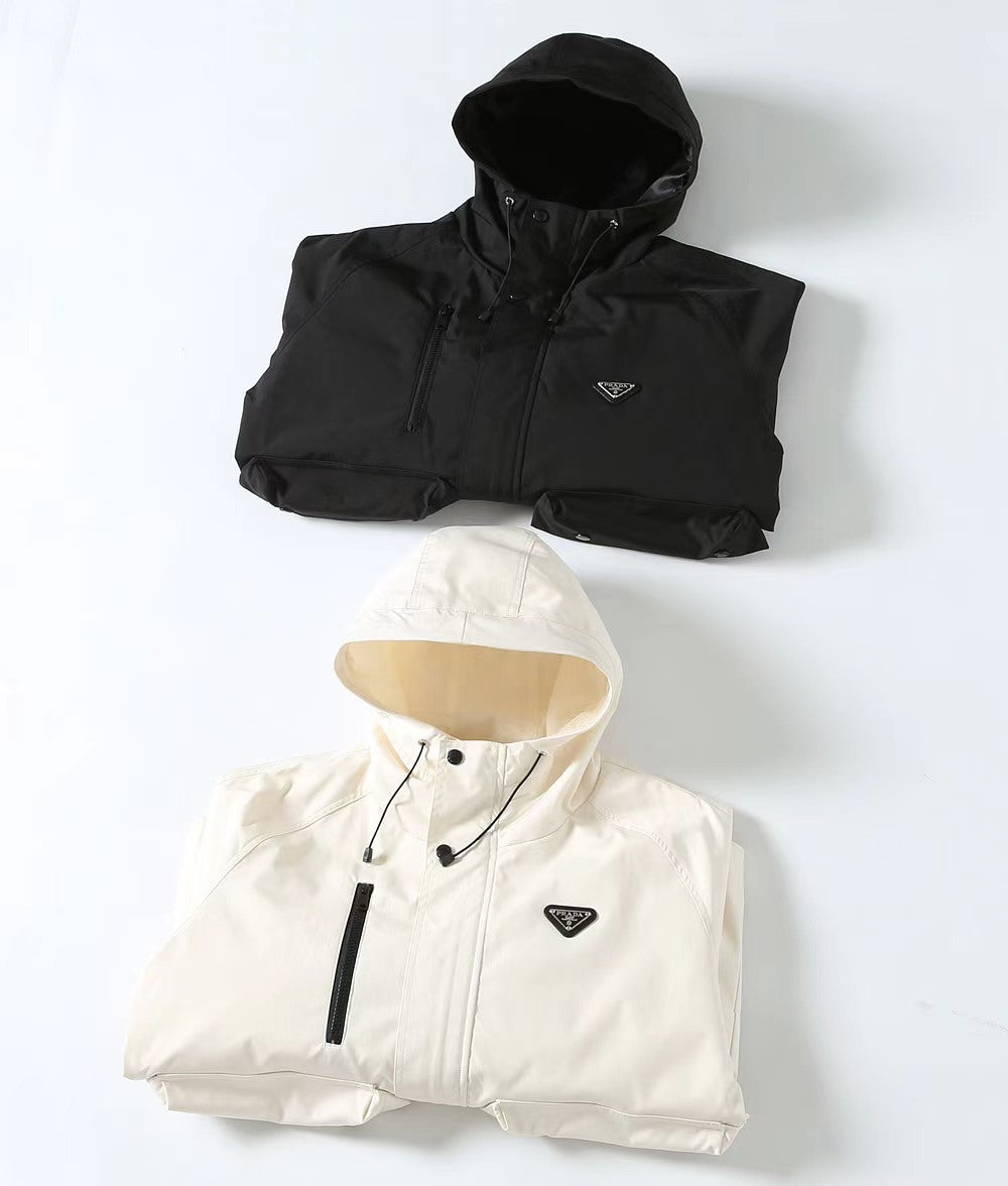 Hooded long jackets: black and white, with Prada triangle logo patch