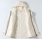 Long hooded Moncler jacket in white with full back view and inner hood label