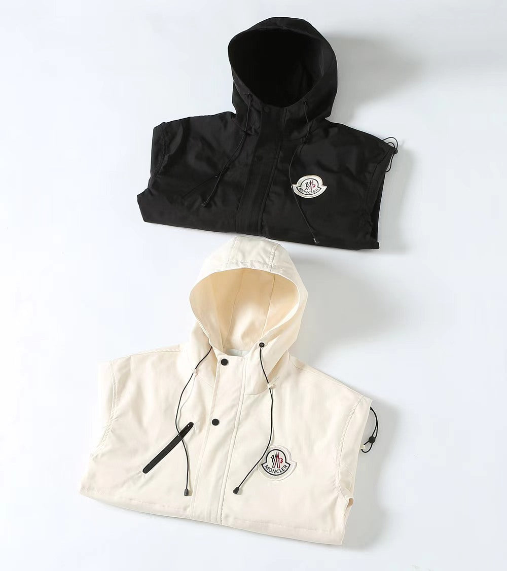 Long hooded Moncler jackets, black and white, with drawstring and front zipper
