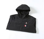 Moncler black hooded jacket, front view with zip and chest emblem