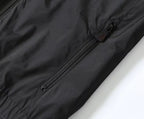 Moncler black jacket close-up, metal zipper and pull on front
