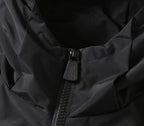Black Moncler jacket zipper with metal pull and logo pull tab