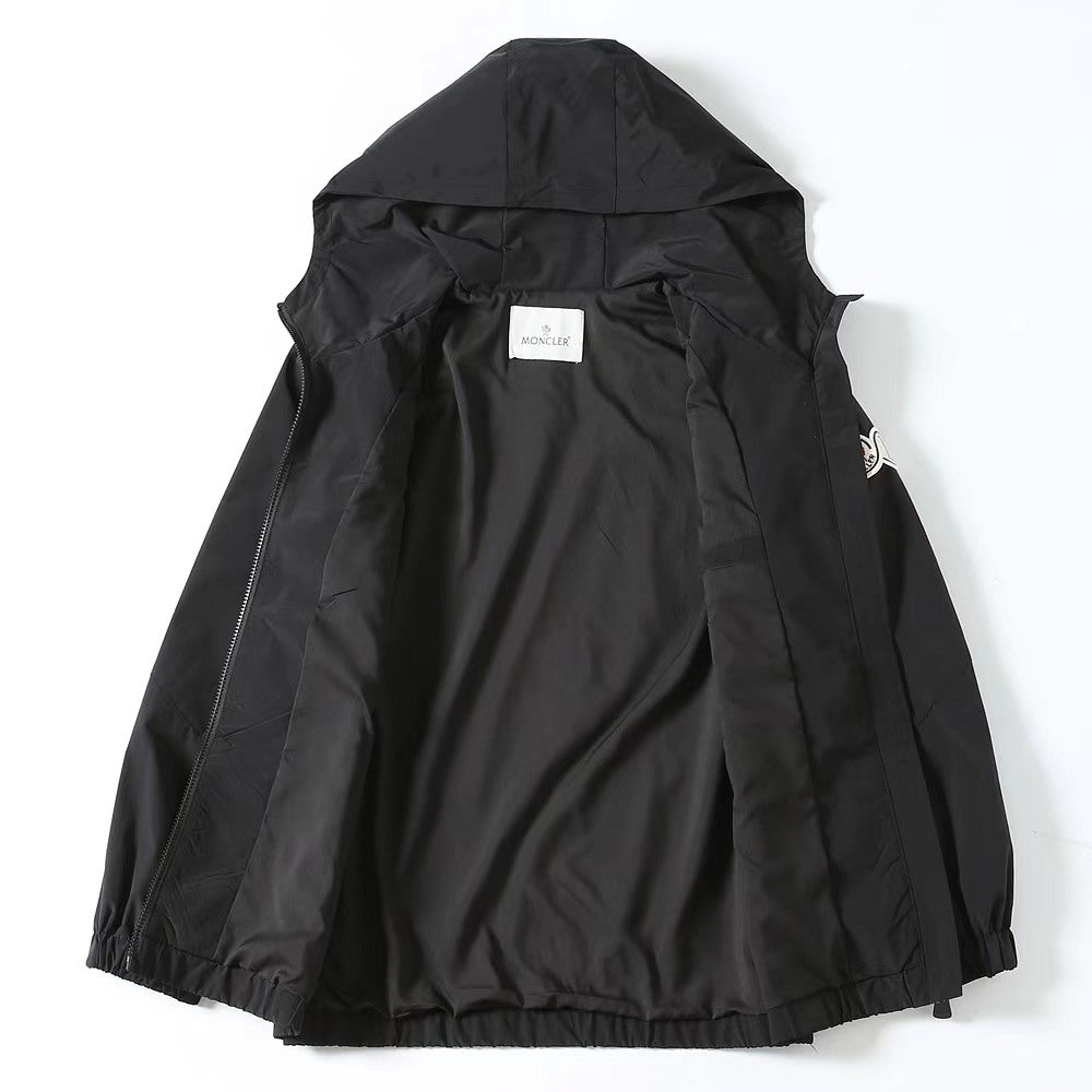 Moncler long black jacket back view, hood and inner yoke label
