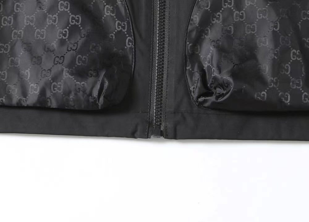 Gucci hooded jacket front zipper and inner placket detail in dark fabric