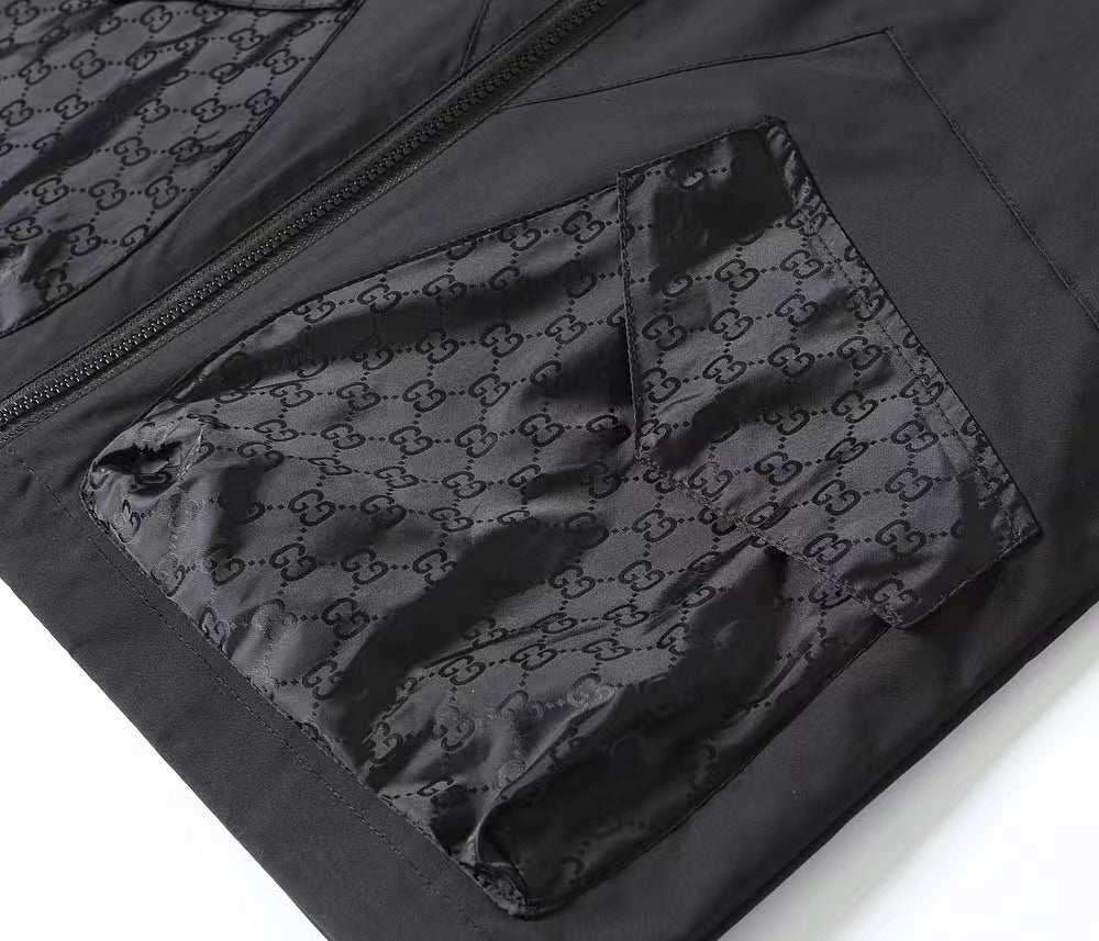 Gucci black jacket lining with GG monogram pattern and stitched seams