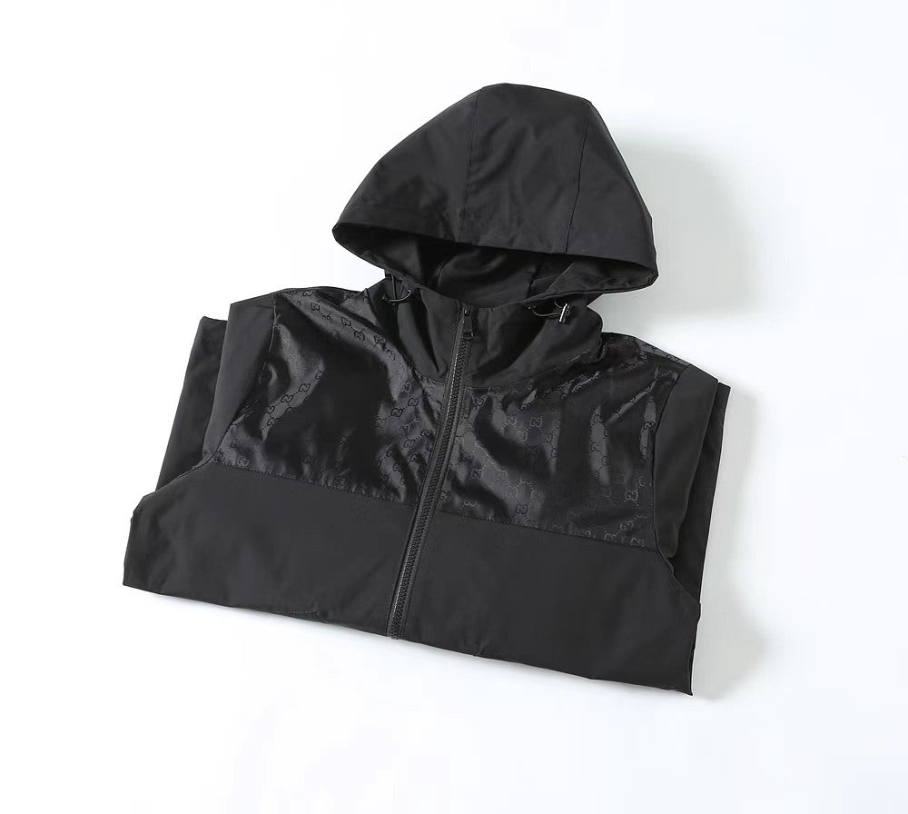 Gucci black hooded jacket with zip front and contrast chest panel