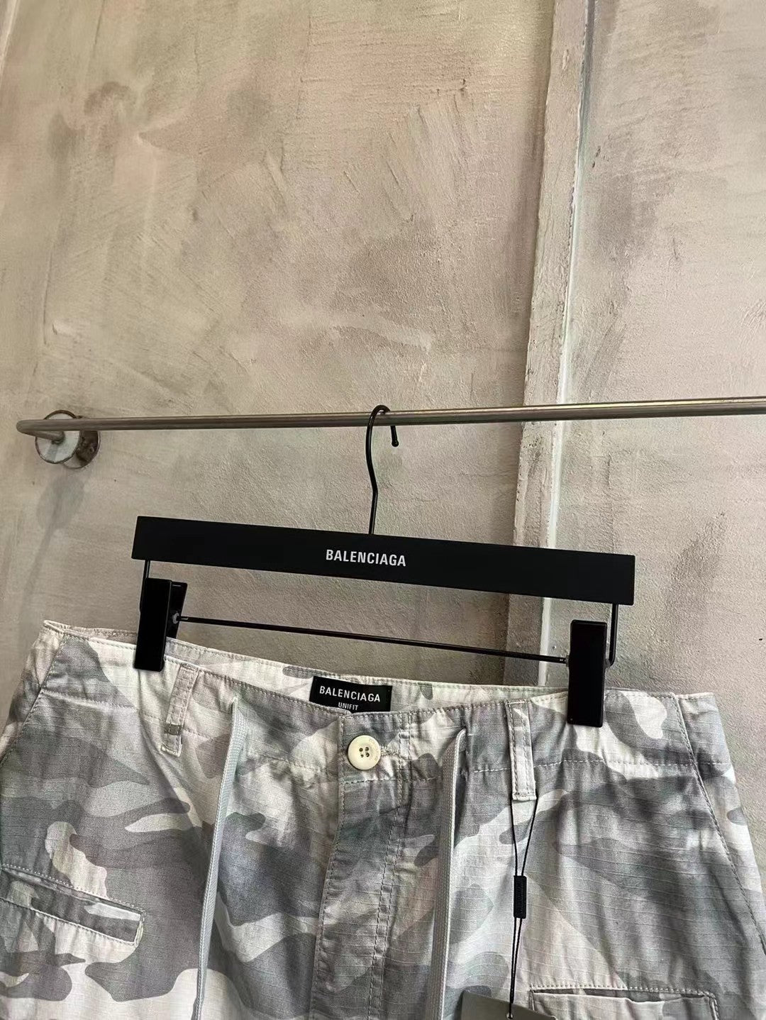 Balenciaga camouflage cargo pants, light gray and white, waistband with button closure