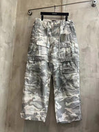 Balenciaga camouflage cargo pants, light gray and white, front view with multiple pockets