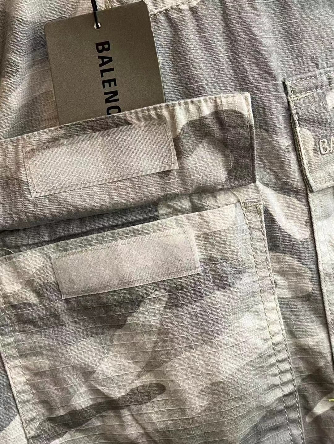 Balenciaga camouflage cargo pants, light gray and white, front pocket and stitched cargo panel