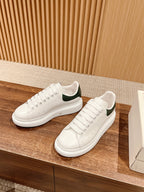 Alexander McQueen leather sneakers, white with green collar detail and white rubber sole