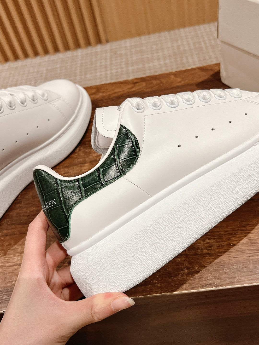Alexander McQueen leather sneakers, white with dark green heel panel and perforated toe
