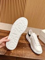 Alexander McQueen leather sneakers, white with textured rubber outsole