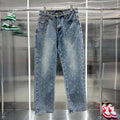 Louis Vuitton blue denim pants with monogram pattern, belt loops, button fly